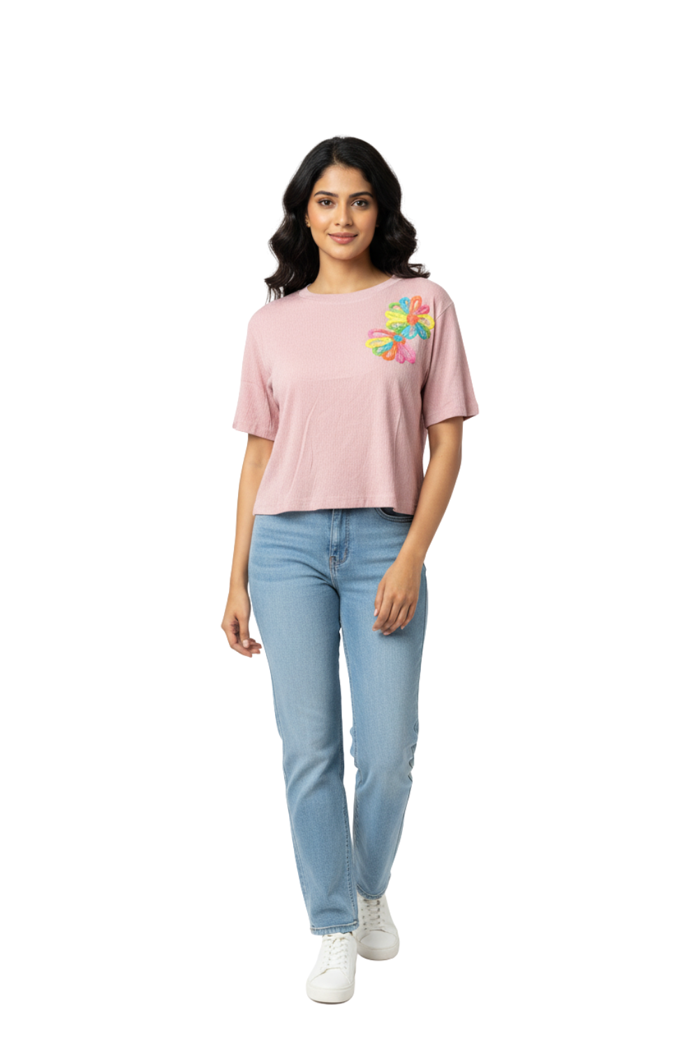 woman wearing plain pink top with floral appliqué from Hava Fashions