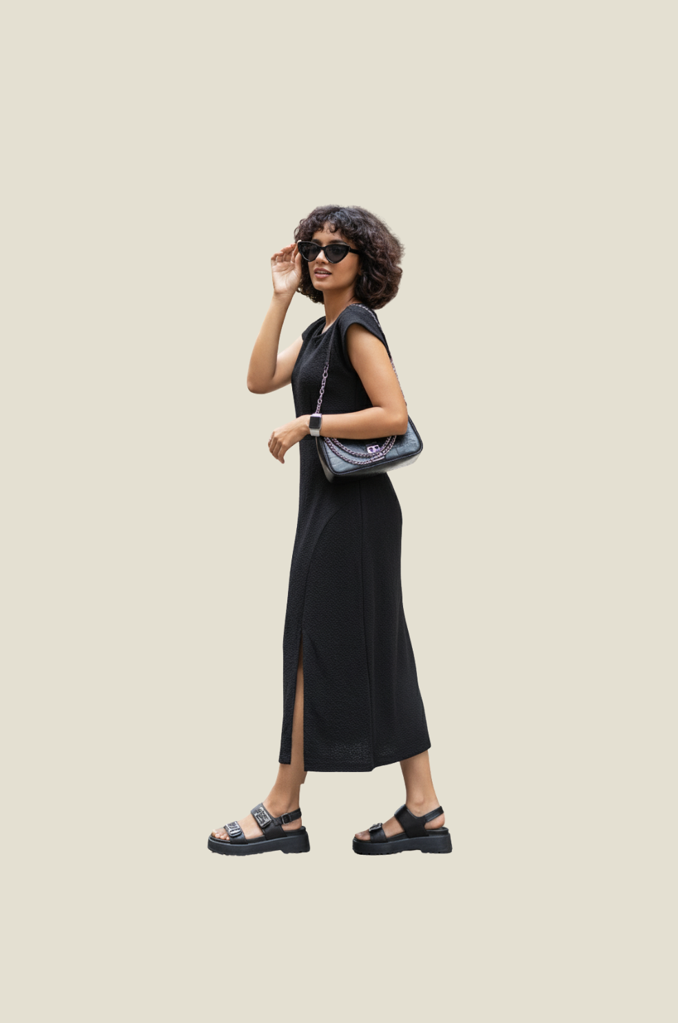 woman wearing elegant black sheath dress from Hava Fashions