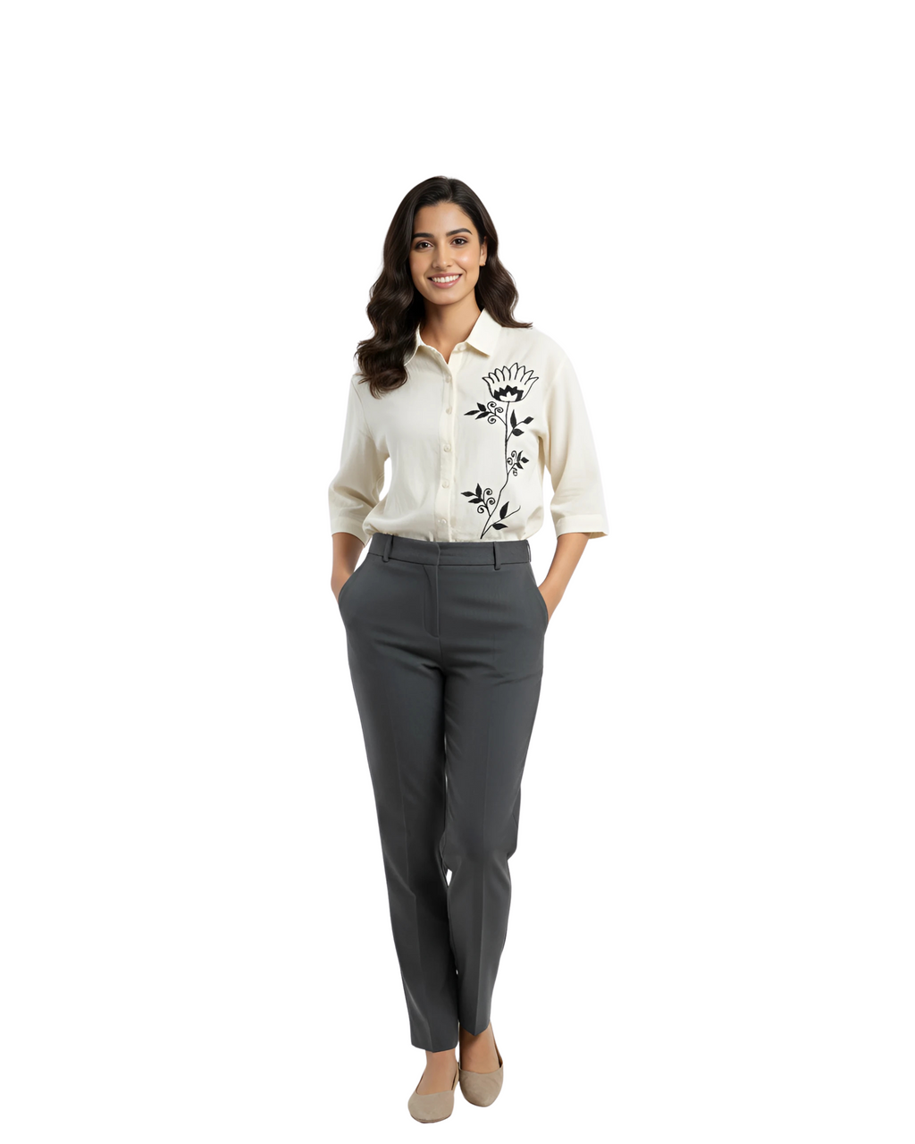 woman wearing cream shirt with black floral embroidery from Hava Fashions