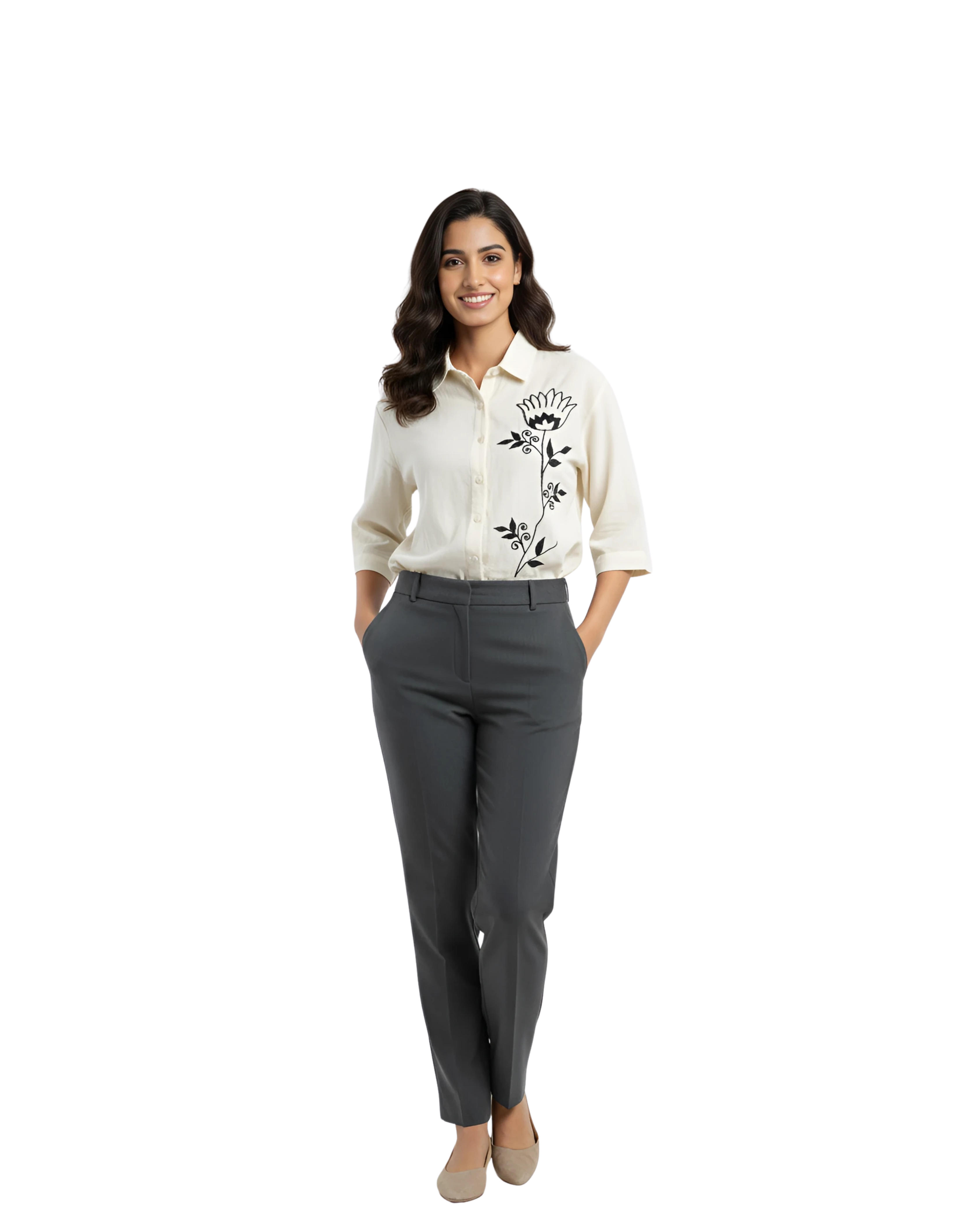 woman wearing cream shirt with black floral embroidery from Hava Fashions