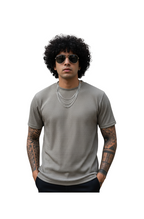 man wearing grey popcorn fabric round neck t-shirt from Hava Fashions