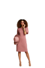 woman wearing dusty rose pink puff sleeve ribbed midi dress from Hava Fashions