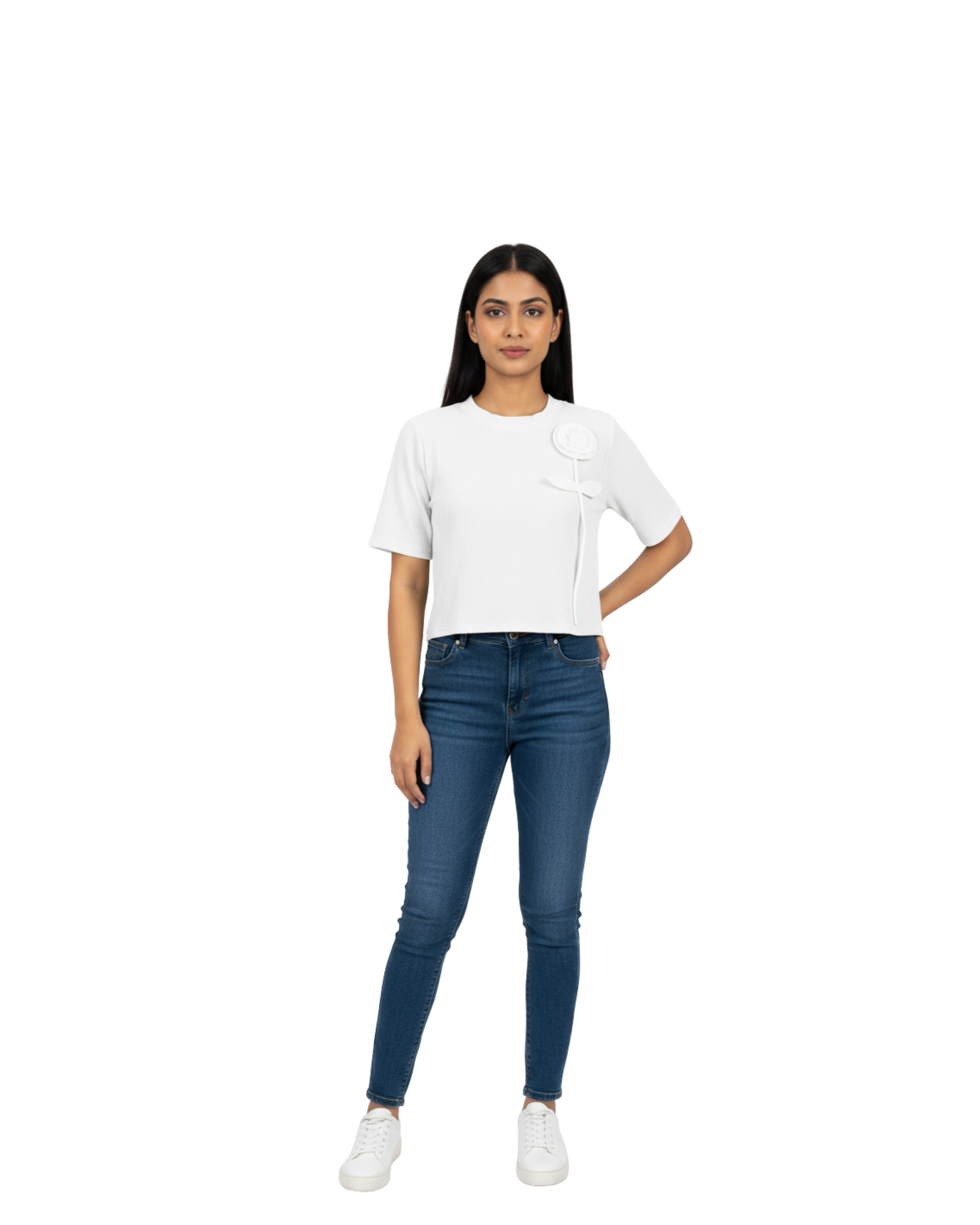 Woman wearing a white t-shirt and blue jeans on a white background